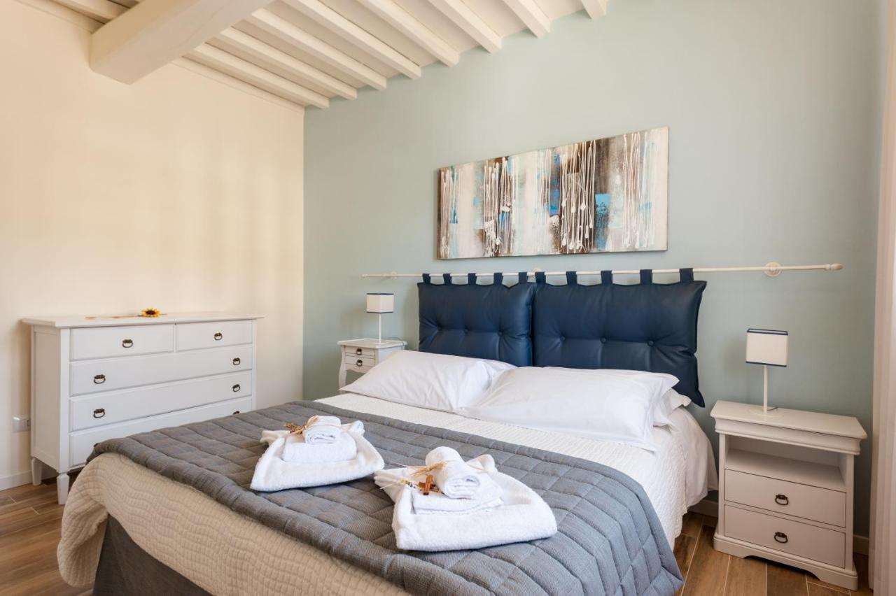 Appartamento Le Residenze Chianni Esterno foto
