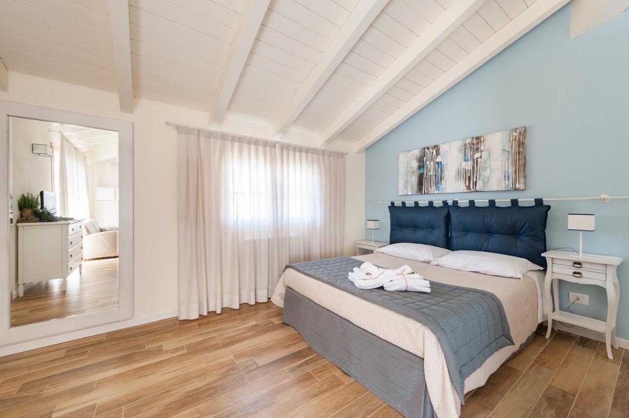 Appartamento Le Residenze Chianni Esterno foto