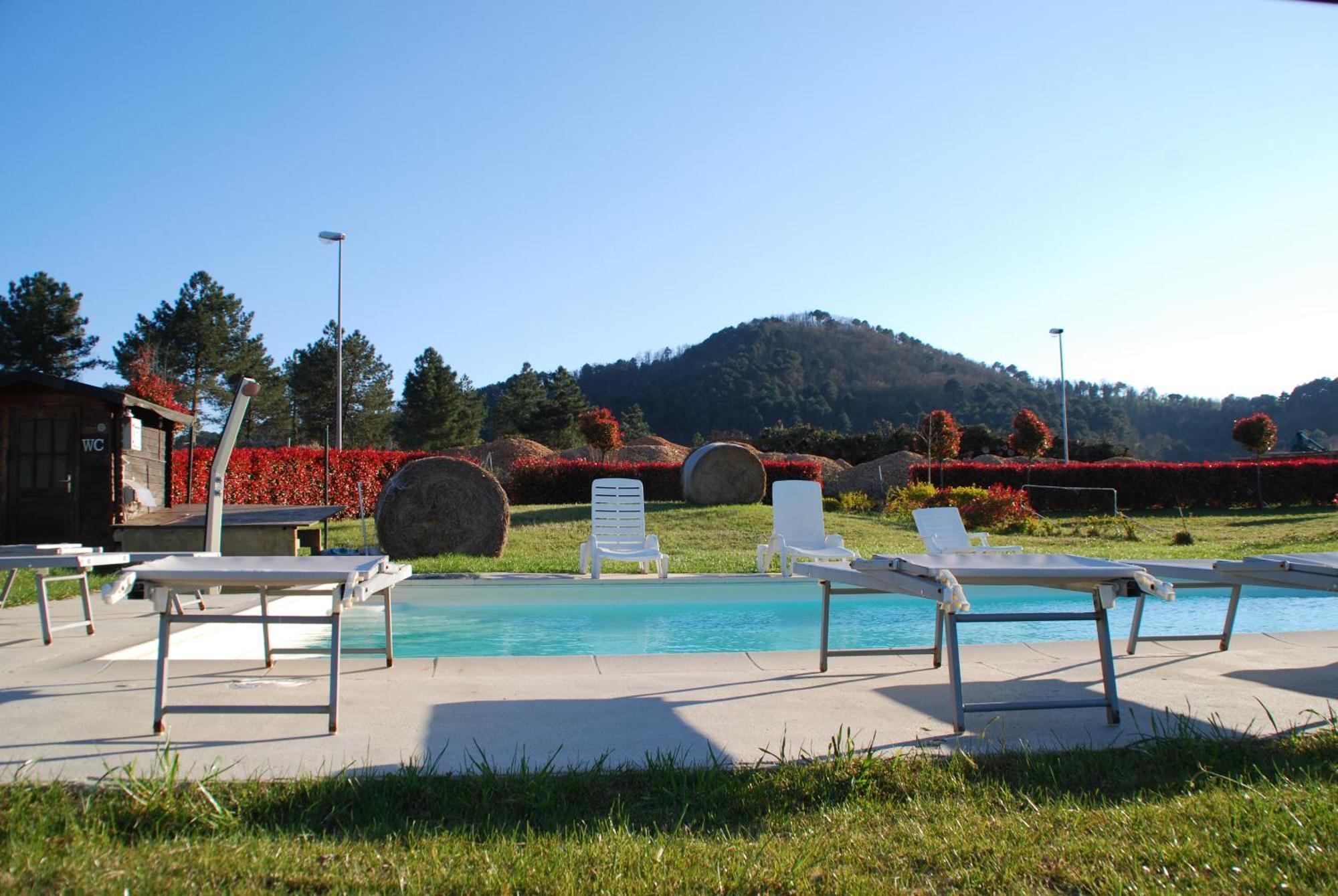 Appartamento Le Residenze Chianni Esterno foto