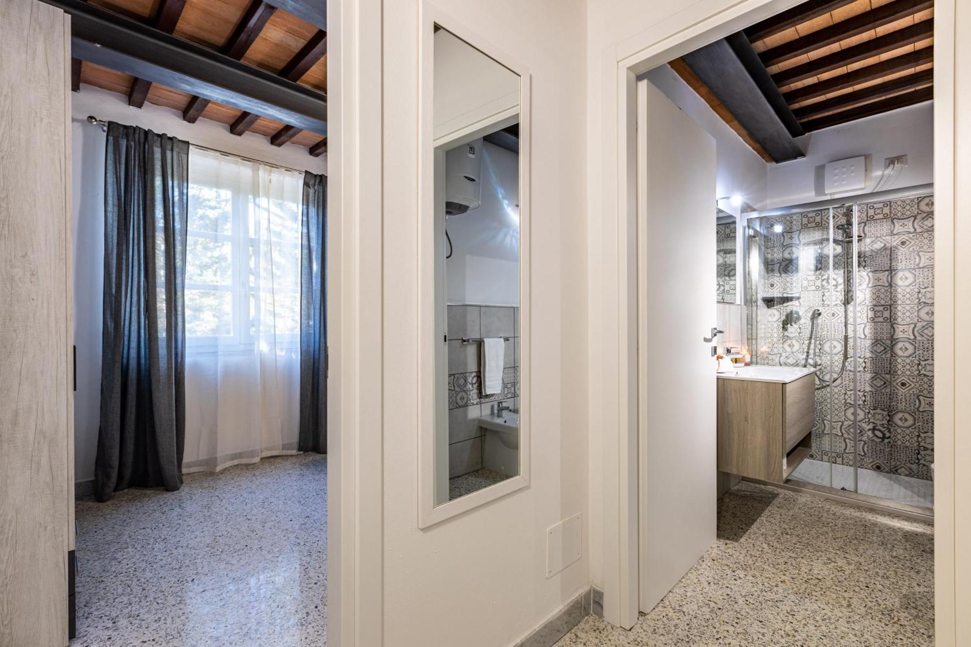 Appartamento Le Residenze Chianni Camera foto